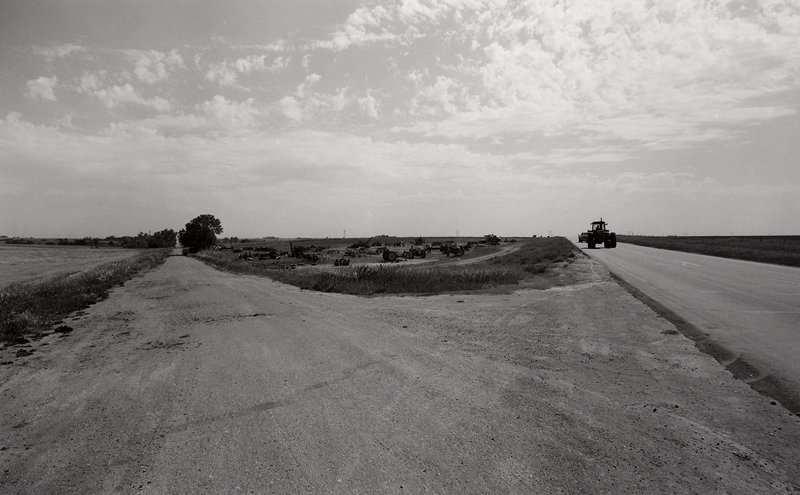 Tractor and Tractor Graveyard, Near Kansas/ Nebraska Border, Lawrence McFarland, 1976