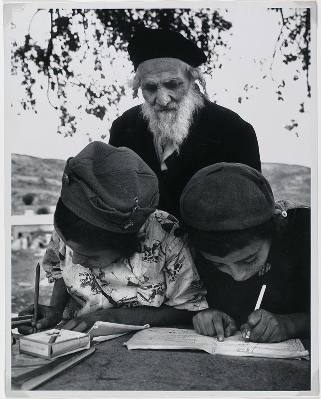 Rabbi Supervises the Schooling of His Orthodox Pupils in an Immigrant Transit Camp, Galilee Region, Israel, Robert Capa, 1950