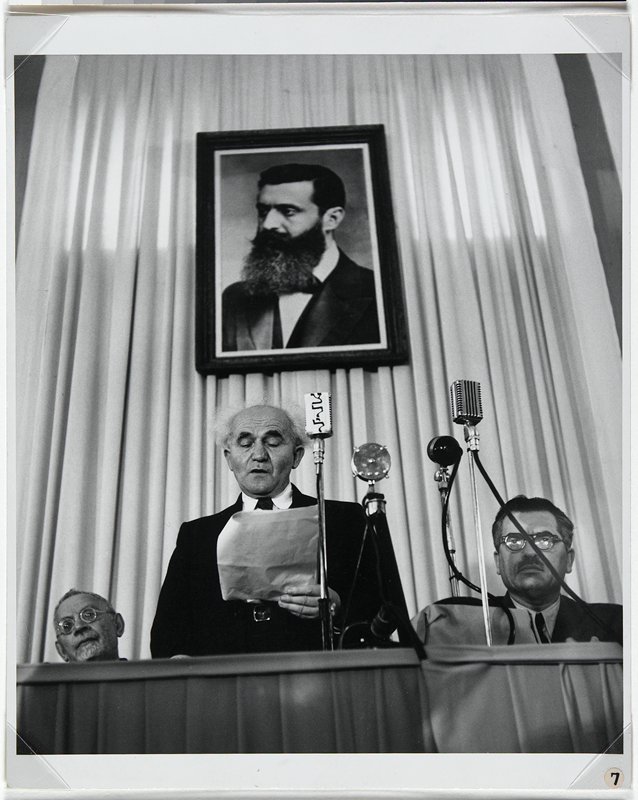 Ceremony of the Declaration of the State of Israel: David Ben-Gurion reading the Proclamation of Israel's Statehood, Tel Aviv Museum, May 14, 1948, Robert Capa, 1948