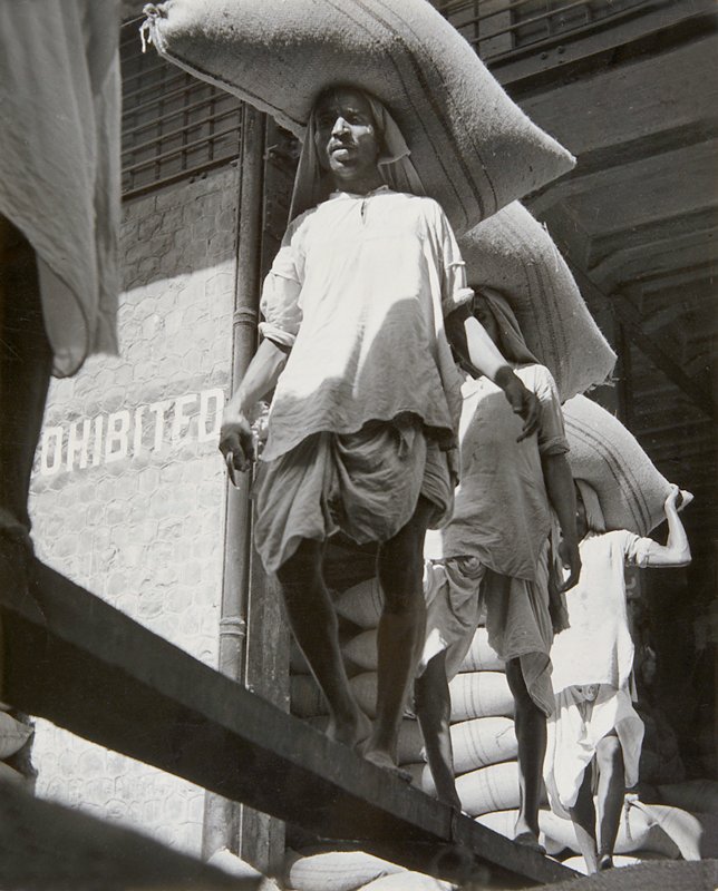 Workmen Carry Newly Arrived Wheat in the Docks of Calcutta, India, Werner Bischof, 1951