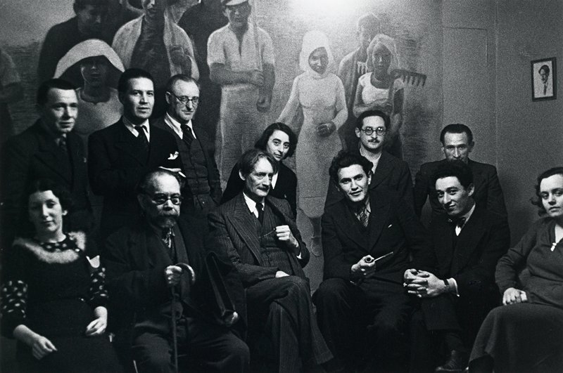 Untitled (Henri Barbusse [center] surrounded by leading left-wing intellecutals in his office of the literary journal 'Monde', Paris), David Seymour, c. 1935