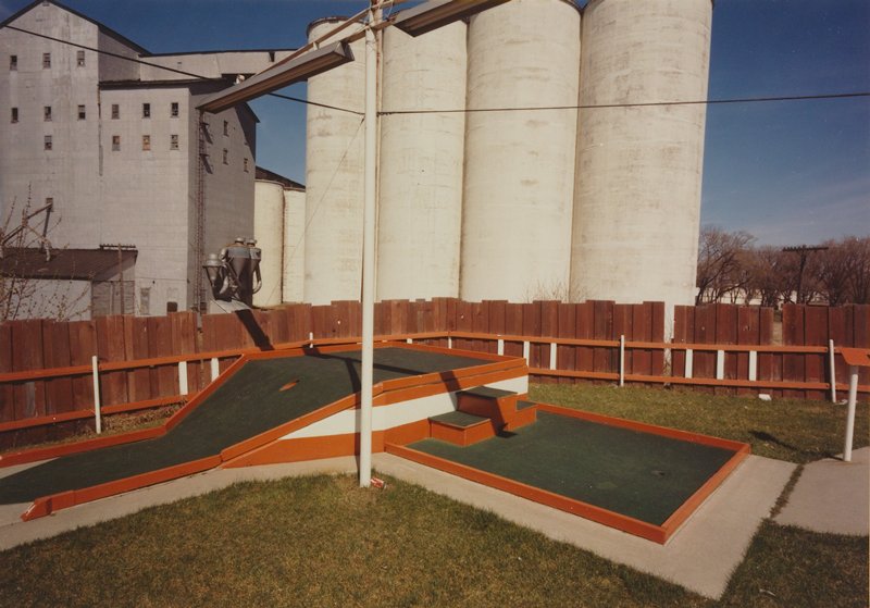 Lake St. Putt-Putt and Old Elevator, Minneapolis, Stuart D. Klipper, 1974