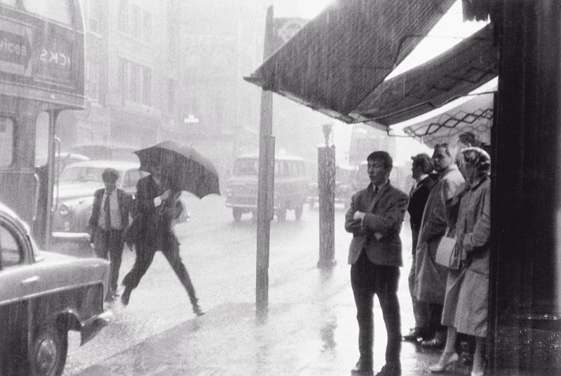 Untitled [man with umbrella, jumping], Bruce Davidson, 20th century