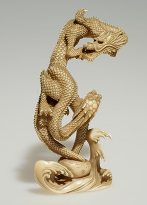 Two dragons emerging from a bowl amid waves, Jukō 壽光, late 19th century
