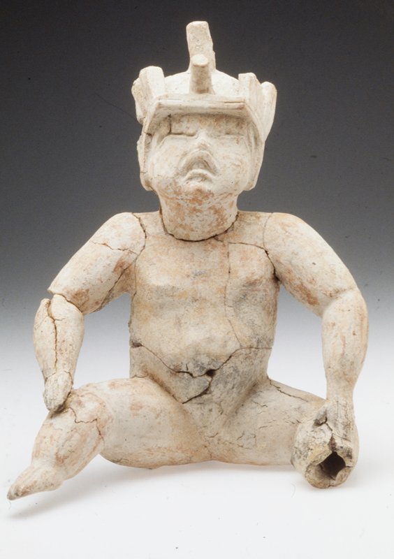 Seated figure with flaming eyebrows, c. 1600 BCE