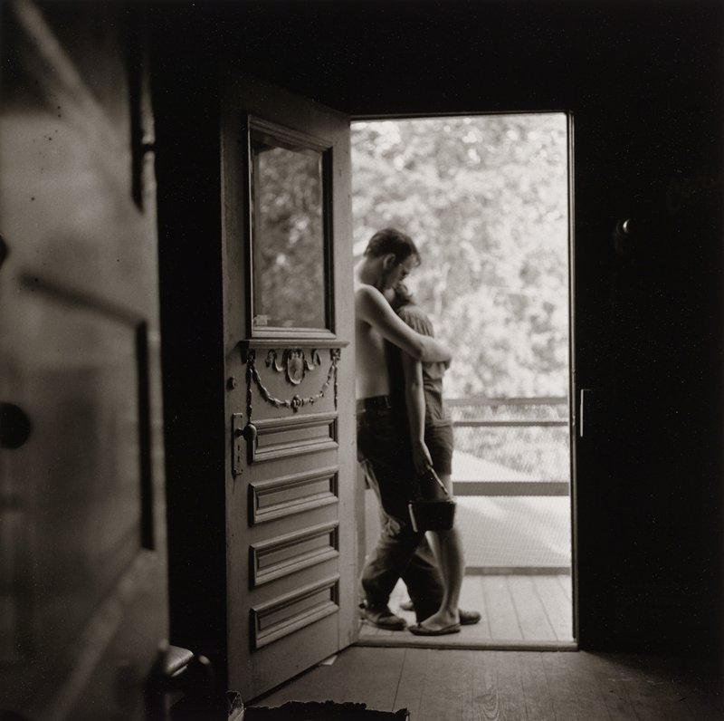 Lovers in a Doorway, Houston, Texas by Larry Fink