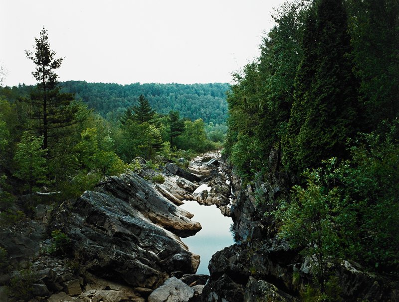 Untitled [water and rocks in forest], George Upham, 1961–82