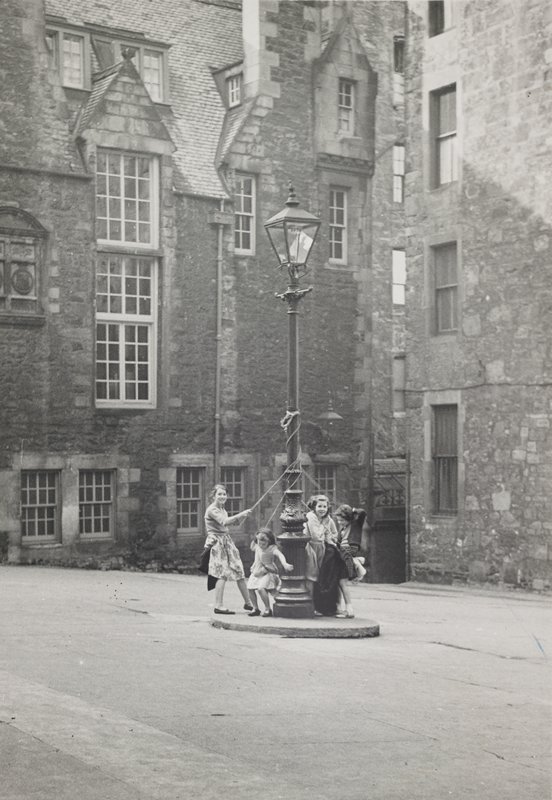 Untitled [children playing at lamp post], Robert Gene Wilcox, 20th century