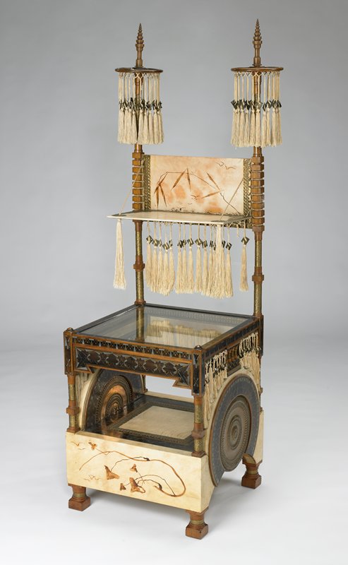 Collector's cabinet and chair by Carlo Bugatti