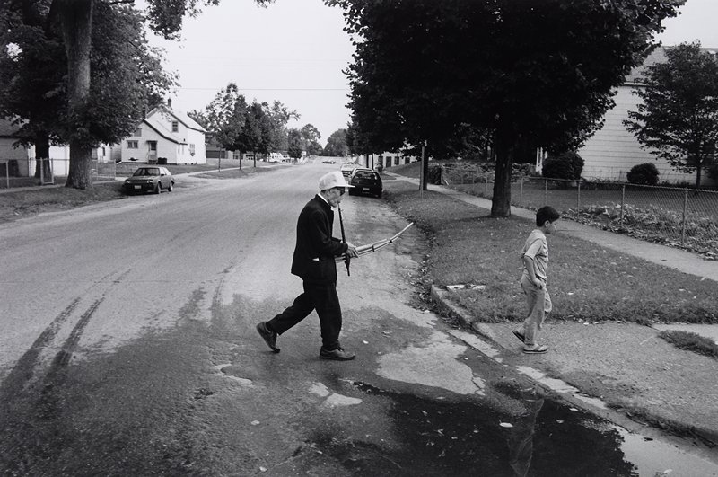 Hmong Man Playing the Kheng, Frogtown, Wing Young Huie, 1994