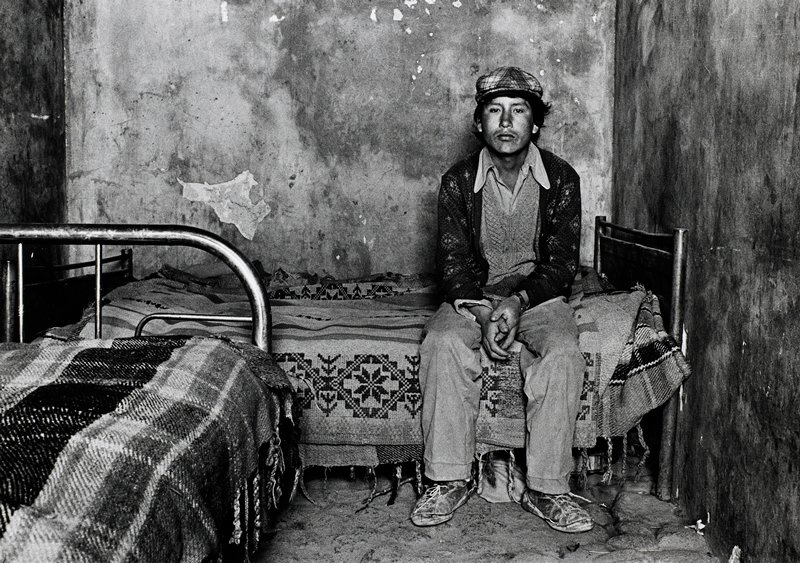 Bolivia Mineros, Felix [young man sitting on bed], Jean-Claude Wicky, 1985