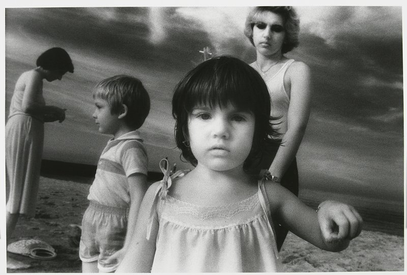 Mothers and Their Children, Cristine Forefront Holding Sand, Joan Moss, 1981