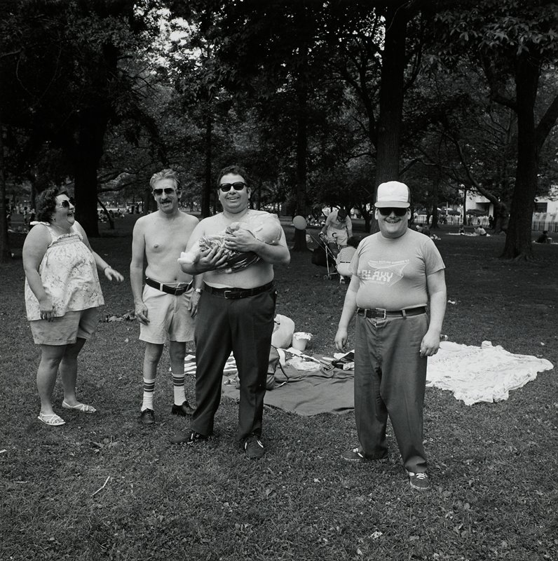 Two Couples with Plastic Baby, Battery Park, New York City, Toby Old, 1986