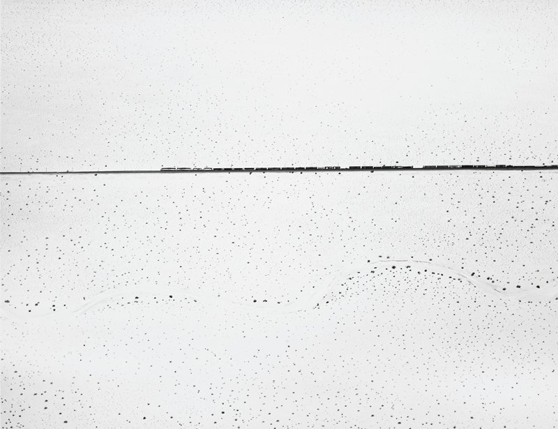 Train Crossing Desert, Kelso, California, William A. Garnett, 1974