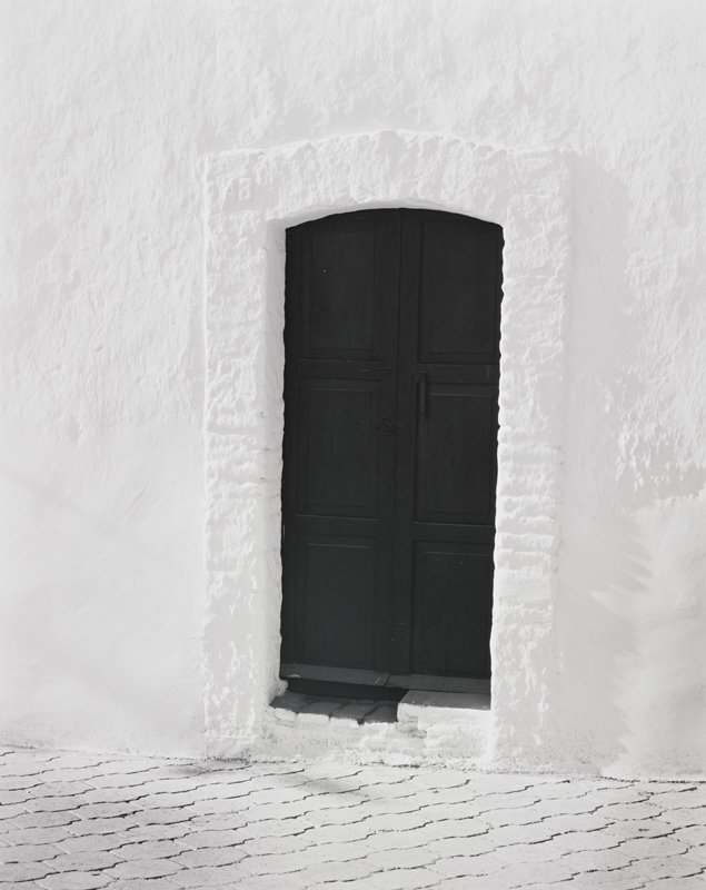 Black Door in White Wall, Alamos Sonora, Mexico, Donald Ross, 1983 (printed c. 1985)