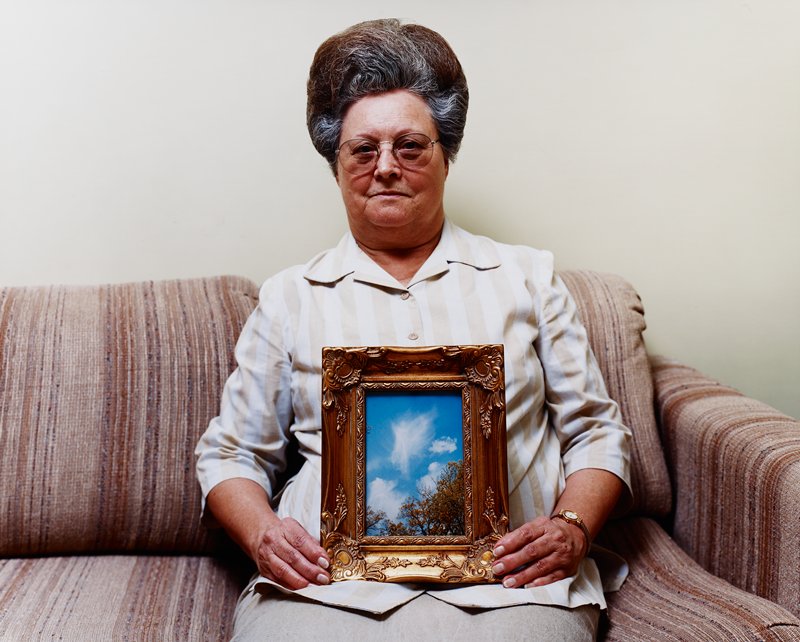 Bonnie (with a photograph of an Angel), Port Gibson, Mississippi, Alec Soth, 2002