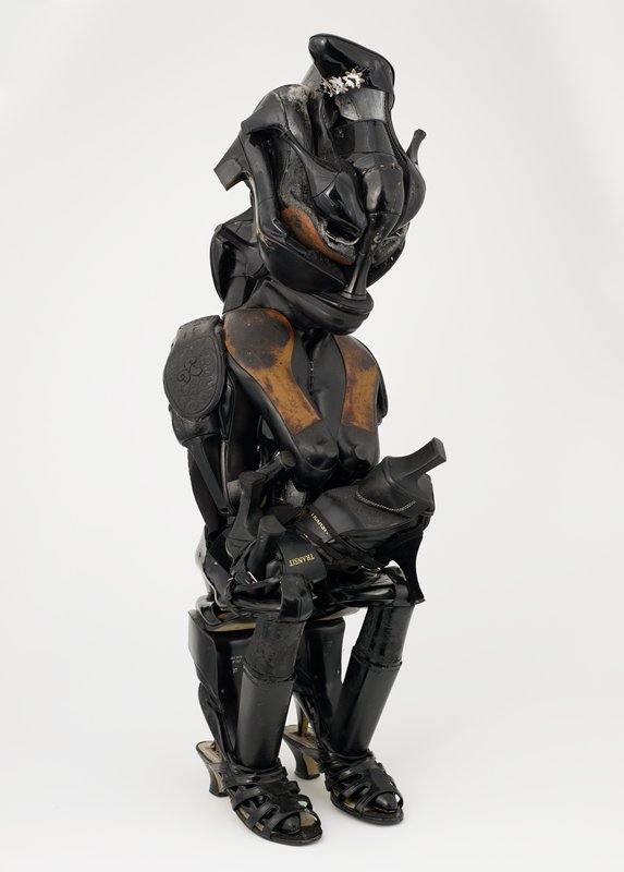 Anne Klein with a Baby in Transit, Willie Cole, 2009