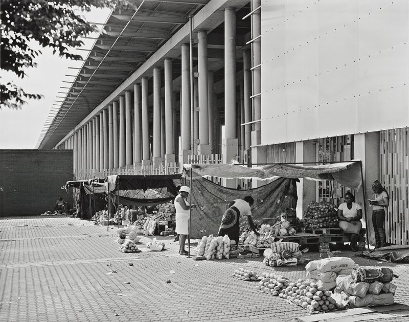 Street traders and the colonnade of the Walter Sisulu Square of Dedication, Kliptown, Soweto, 7 February 2014 by David Goldblatt