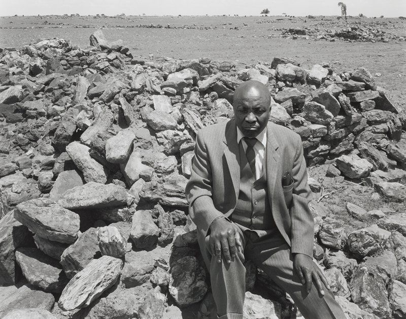 Luke Kgatitisoe in his house, bulldozed in February 1984 by the government after the forced removal of the people of Magopa, a black-owned farm, which had been declared a “black spot”, Ventersdorp district, Transvaal, 21 October 1986 by David Goldblatt