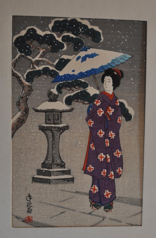 Young woman in snow next to a stone lantern, Toshinobu 年延, 1950s