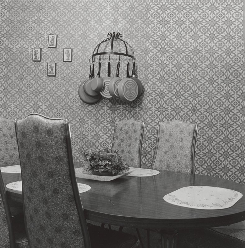 [Dining table with pans on wall], Joanne Leonard, 1977