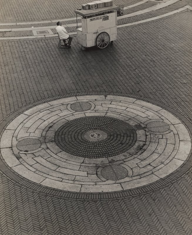 Street Vendor on Patterned Street, Herb Snitzer, 1959