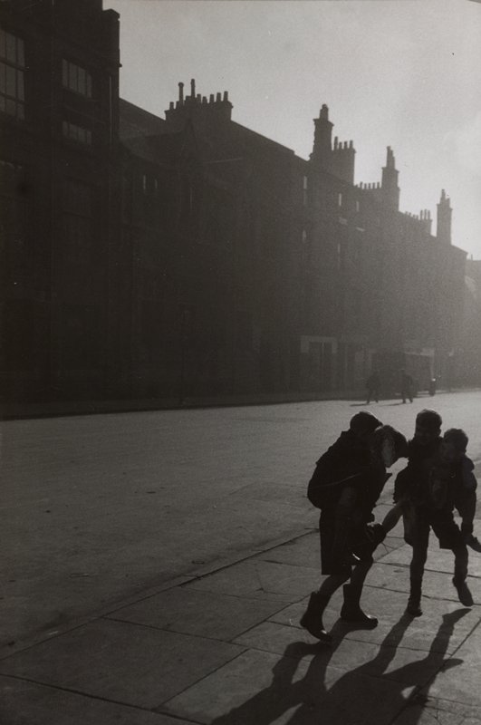 Two pairs of boys playing horseback, Glasgow, Scotland, Jacques Lowe, c. 1955
