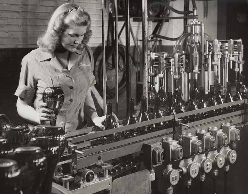 Female worker at bottling facility, Edward W. Quigley, 1948