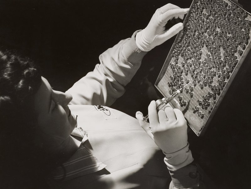 S.K.F. worker greases bearings with syringe, Edward W. Quigley, 1945