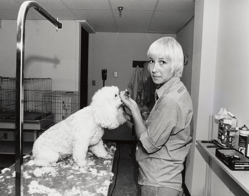 Of all the dogs that come to Poodle Train, Lolita is on of my favorites. She is always cooperative and obedient when I cut her hair. She's a little princess. Pet owners spend a furtune and pamper their pets like they are children. This wash and trim costs $35., Bill Owens, 1974–76 (printed later)