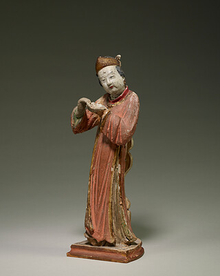 Female musician, one of a pair, 10th century