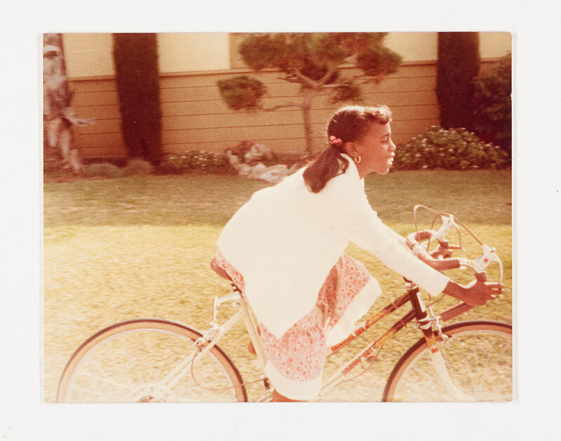 [Girl riding bicycle], c. 1980