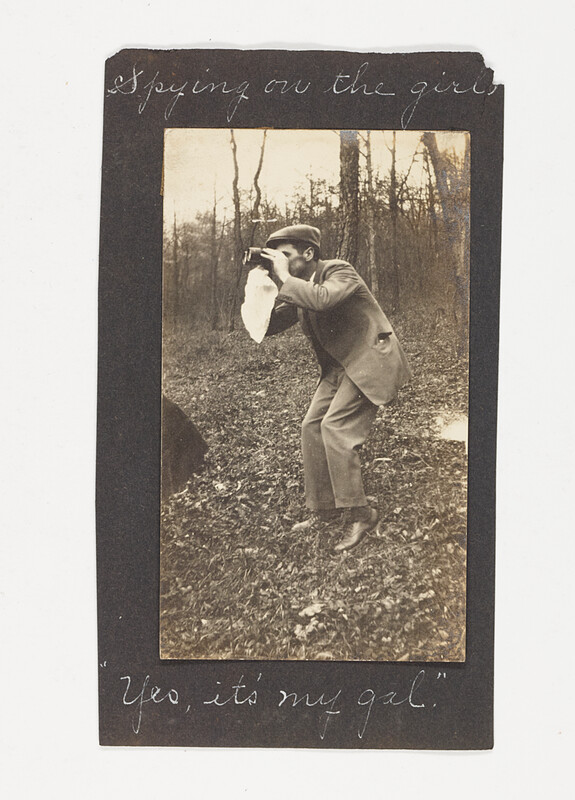 [Man crouching with binoculars], c. 1920