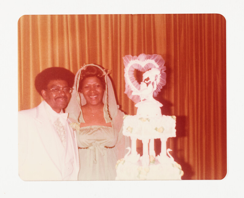 [Wedding couple with cake], c. 1975