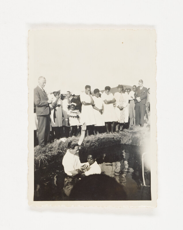 [Outdoor baptism with gathered crowd], c. 1955