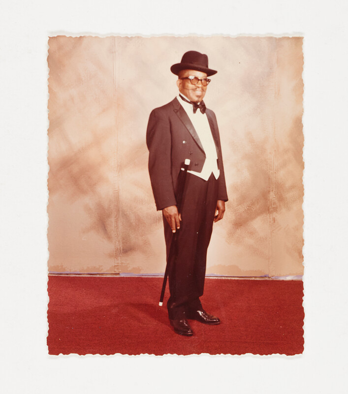 [Man in tuxedo and hat with cane], 1973