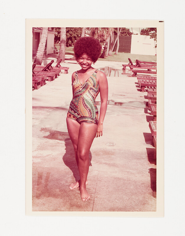 [Woman in patterned swimsuit at poolside], c. 1975