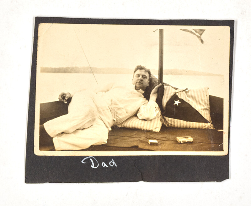 [Man reclining on boat deck], c. 1925
