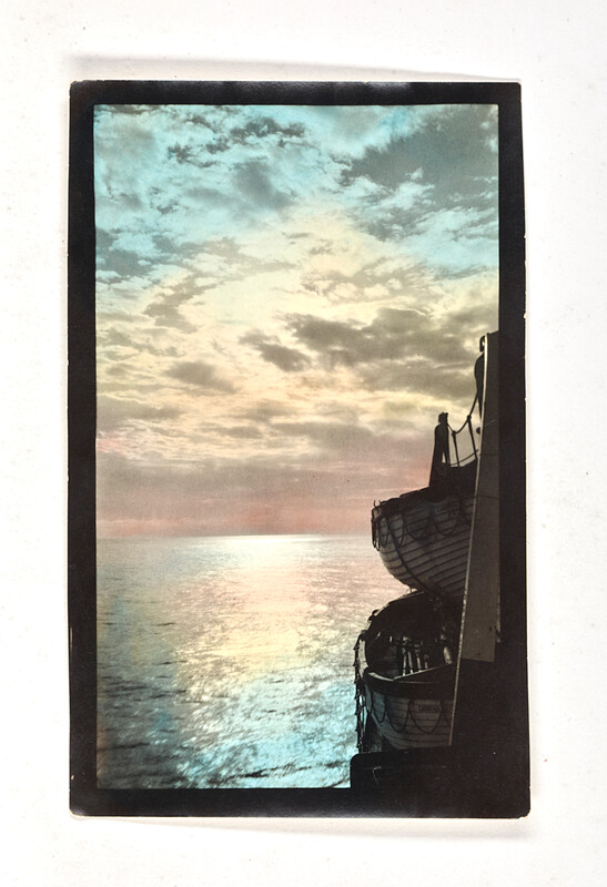 [Sunset over water with lifeboats], c. 1925