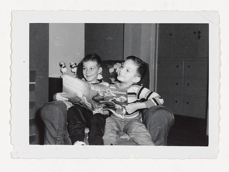 [Two boys reading a Christmas book], c. 1950