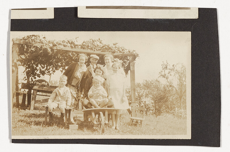 [Group portrait in garden], c. 1910–20