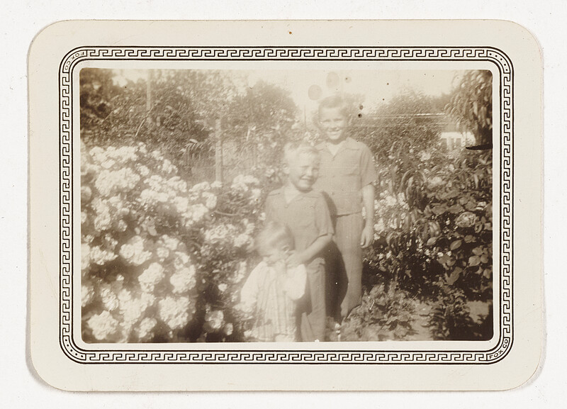 [Two children in garden], c. 1940