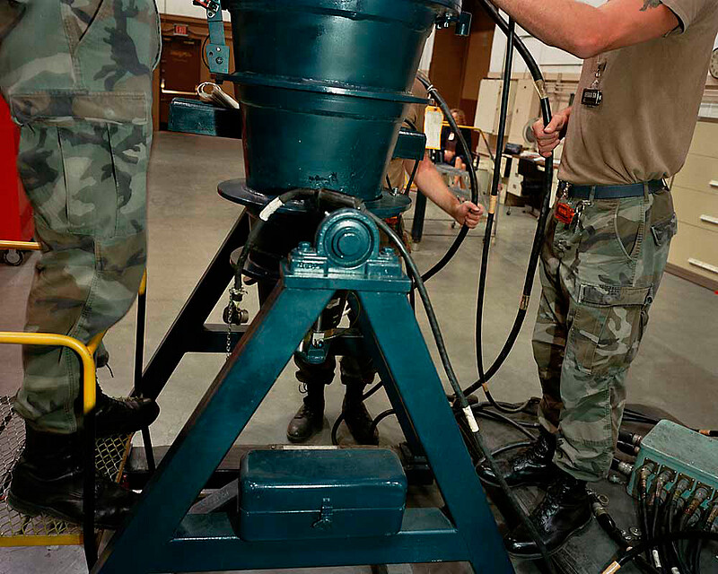 Minuteman III missile W62/Mk-12 reentry vehicle (warhead) with 170 kiloton yield, in testing stand, F.E. Warren Air Force Base, Wyoming, Paul Shambroom, 1992